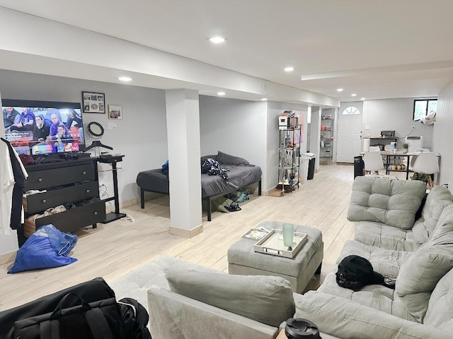 living room with light hardwood / wood-style flooring