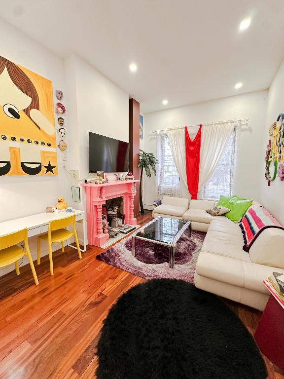 living room with hardwood / wood-style flooring