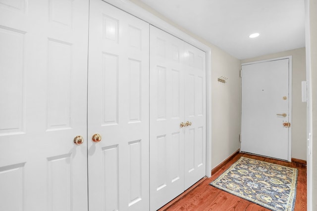 foyer featuring recessed lighting and light wood-style floors