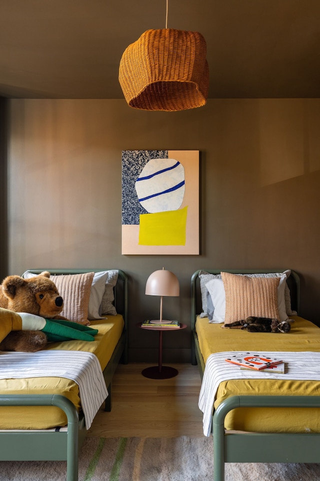 bedroom featuring wood finished floors