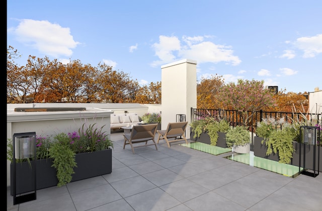 view of patio / terrace featuring fence