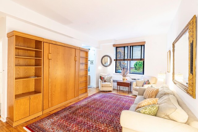 sitting room featuring radiator heating unit