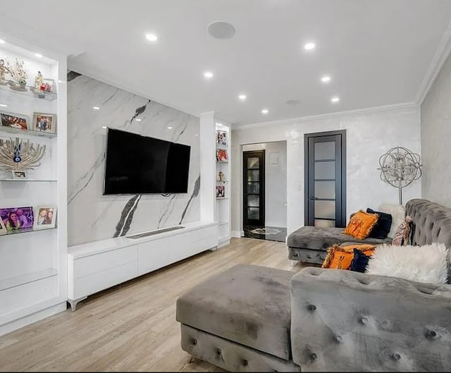 living area with light wood-style floors, recessed lighting, and ornamental molding