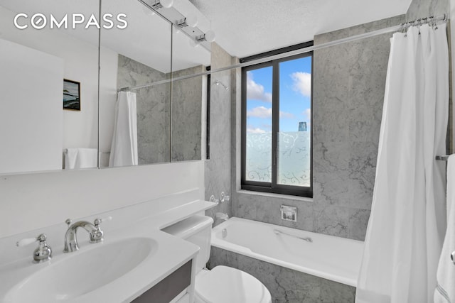 200 Rector Pl Unit 14E, New York City, NY 10280 - full bath with healthy amount of natural light, vanity, toilet, a combined bath / shower with marble appearance, and a textured ceiling