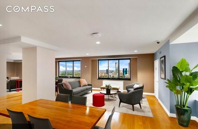 200 Rector Pl Unit 14E, New York City, NY 10280 - dining area with light wood-type flooring, baseboards, and recessed lighting