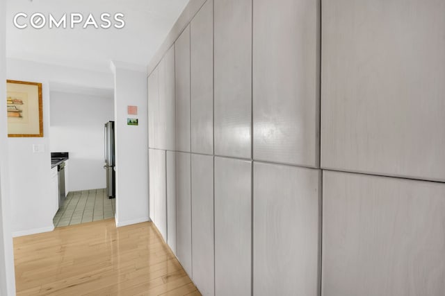 200 Rector Pl Unit 14E, New York City, NY 10280 - hall featuring light wood-style floors