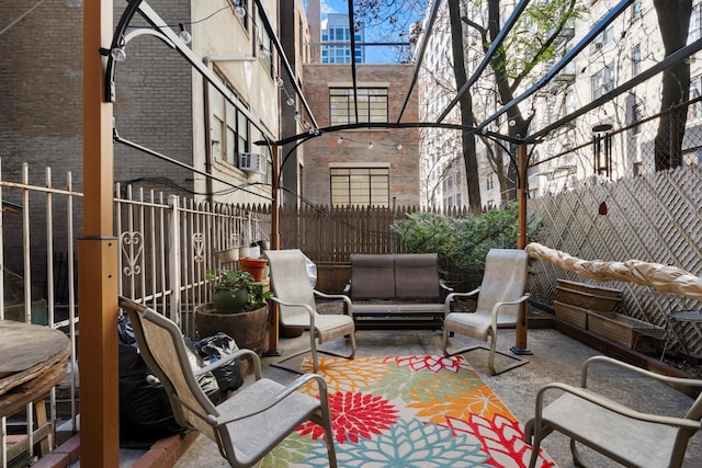 249 W End Ave, New York City, NY 10023 - view of patio featuring an outdoor living space and fence