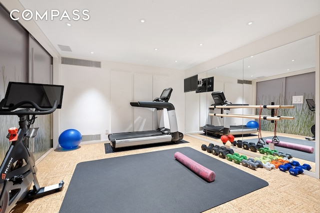 workout room featuring visible vents and recessed lighting