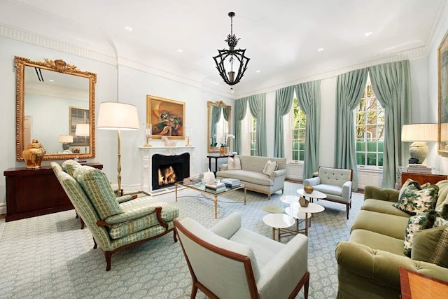 13 E 94th St, New York City, NY 10128 - living area featuring ornamental molding, a warm lit fireplace, and a chandelier