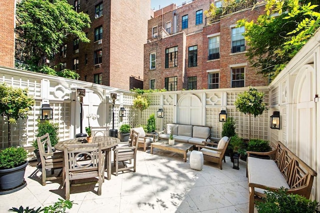 13 E 94th St, New York City, NY 10128 - fenced backyard with a patio, an outdoor hangout area, and outdoor dining area