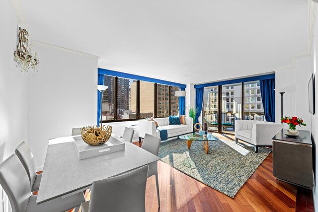 living area with hardwood / wood-style flooring