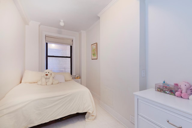 bedroom featuring crown molding