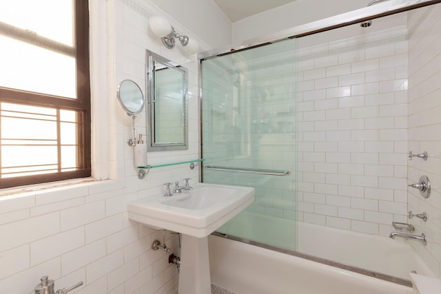 full bath with combined bath / shower with glass door