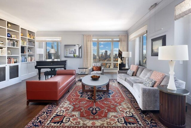 living room with ceiling fan and dark wood-type flooring