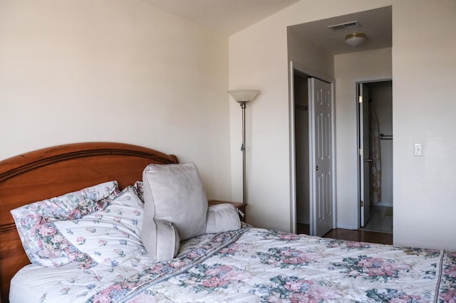 bedroom with visible vents