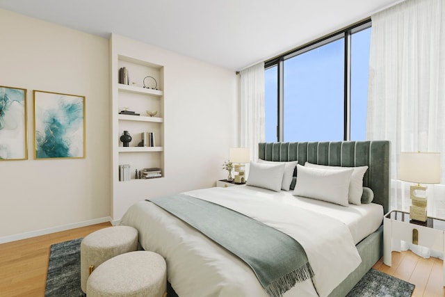 bedroom featuring hardwood / wood-style flooring