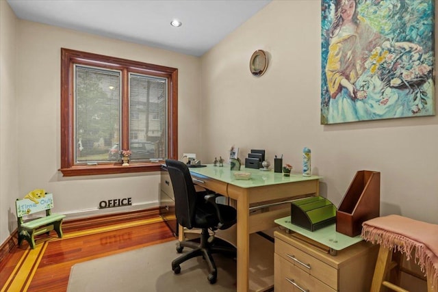 home office featuring hardwood / wood-style flooring