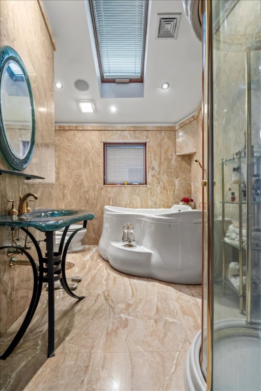 bathroom with independent shower and bath