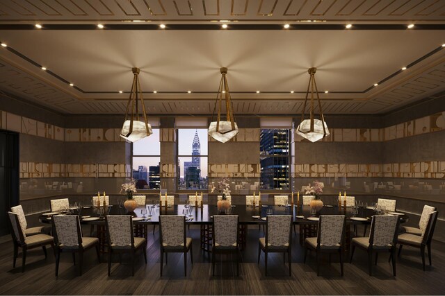 interior space featuring hardwood / wood-style floors and decorative light fixtures