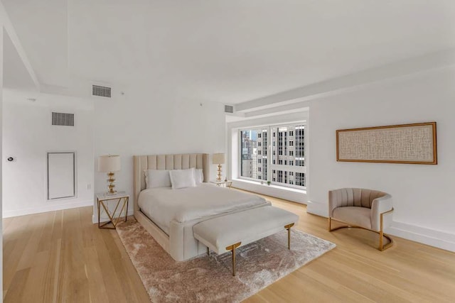 bedroom with light wood-type flooring