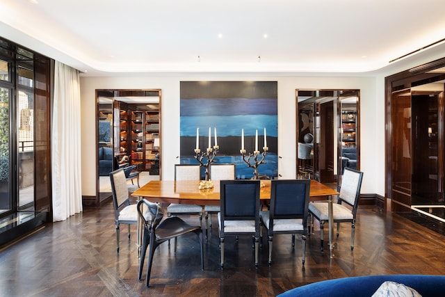 dining room with baseboards