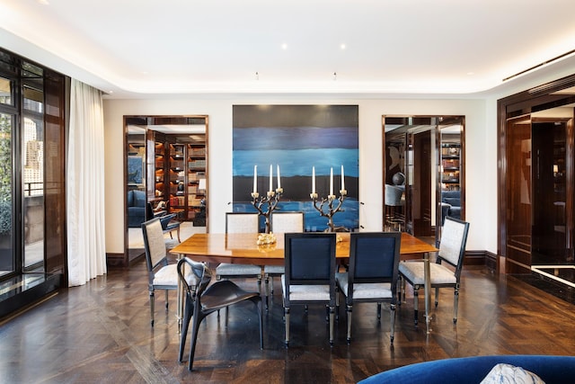825 5th Ave Unit 15Flr, New York City, NY 10065 - dining room featuring baseboards