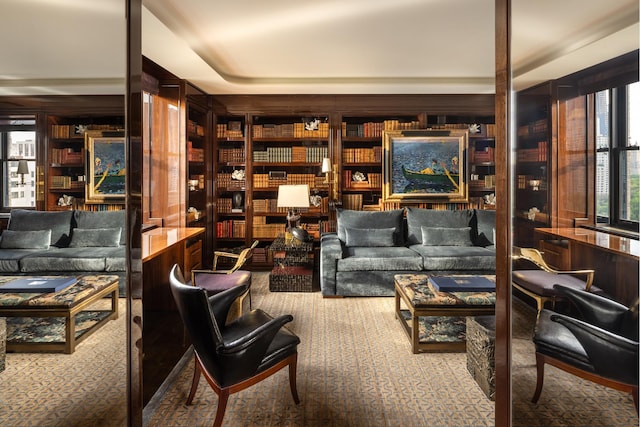825 5th Ave Unit 15Flr, New York City, NY 10065 - living room featuring carpet floors and built in shelves