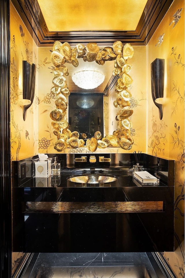 bathroom featuring wallpapered walls and ornamental molding