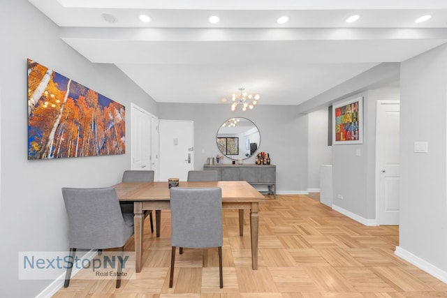 dining area with a notable chandelier, recessed lighting, and baseboards