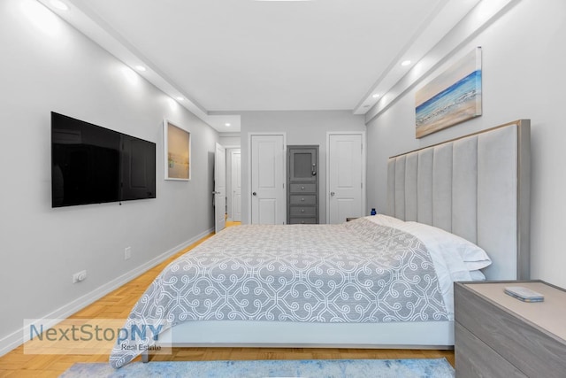 bedroom with recessed lighting and baseboards