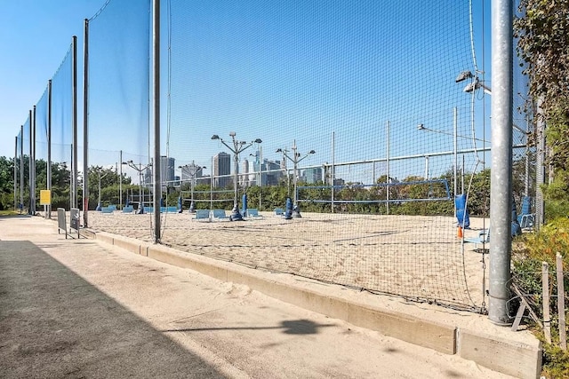 view of home's community featuring volleyball court