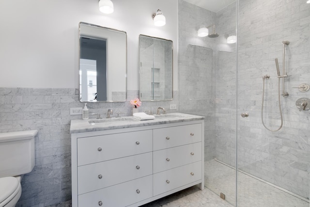 524 Halsey St Unit 202, New York City, NY 11233 - full bathroom with double vanity, tile walls, walk in shower, and wainscoting