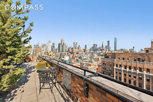 balcony featuring a city view