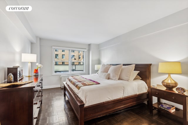 bedroom featuring visible vents and baseboards