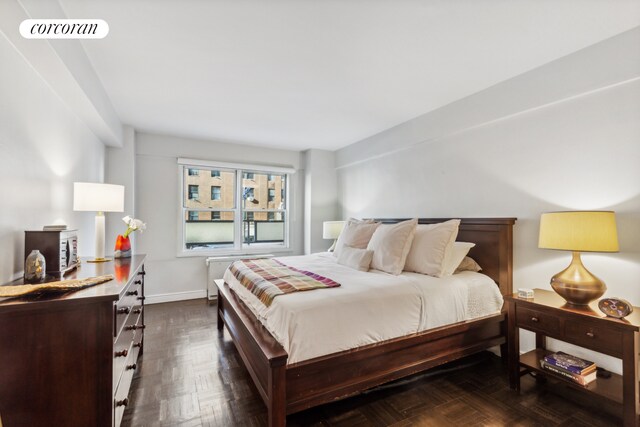 bedroom with visible vents and baseboards