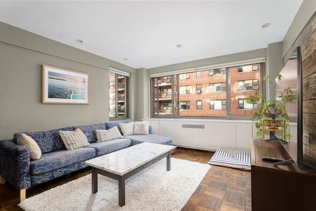 living room with dark parquet floors