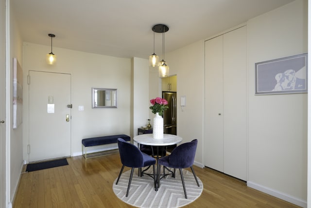 dining room featuring light hardwood / wood-style floors