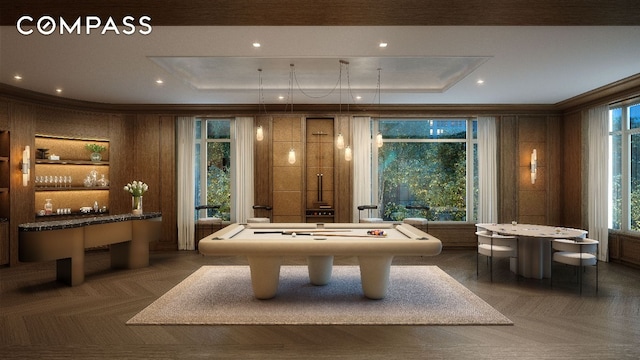 rec room featuring ornamental molding, plenty of natural light, a raised ceiling, and billiards