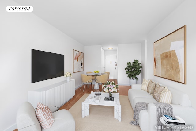 living room with light hardwood / wood-style flooring