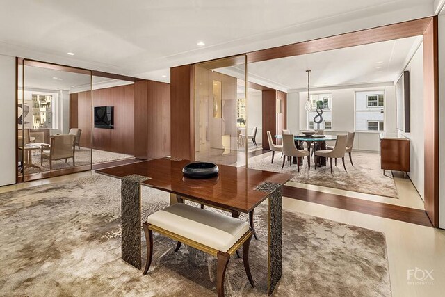 dining space featuring light wood-type flooring