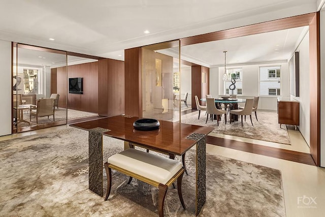 50 E 77th St Unit 11B, New York City, NY 10075 - dining area featuring crown molding, wood finished floors, wooden walls, and recessed lighting