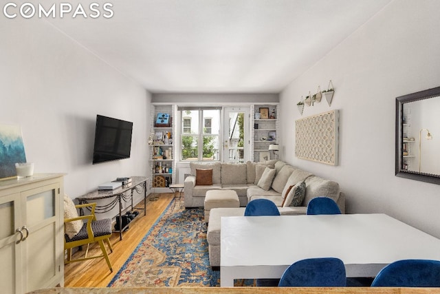 living room with wood-type flooring