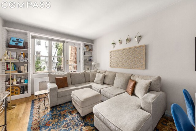 living room with hardwood / wood-style flooring