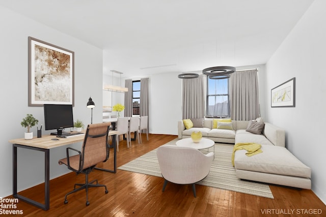 living area featuring hardwood / wood-style floors