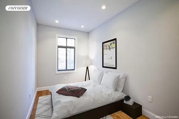 bedroom with light hardwood / wood-style flooring