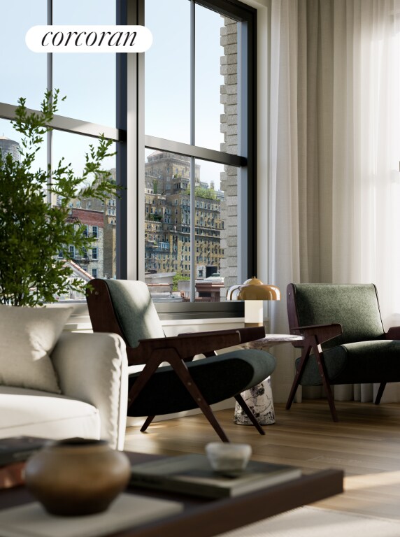 sitting room featuring hardwood / wood-style flooring