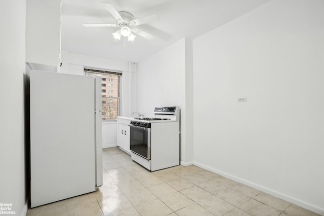 kitchen featuring ceiling fan, white appliances, light tile patterned floors, and white cabinets