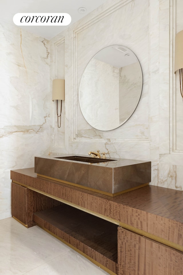 bathroom featuring tile walls