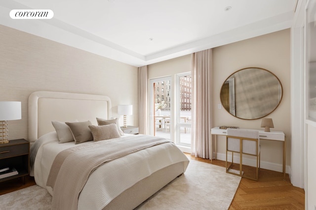 bedroom featuring access to exterior, baseboards, and visible vents