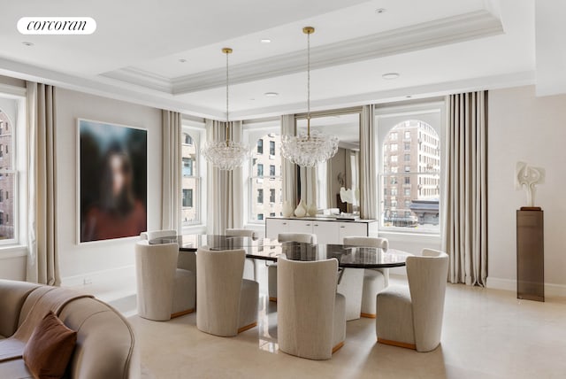 dining area with crown molding, visible vents, a tray ceiling, baseboards, and a notable chandelier